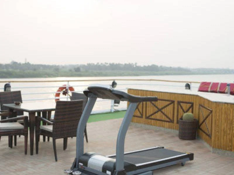 Running machine on Blue Shadow Nile Cruise sundeck overlooking the Nile River