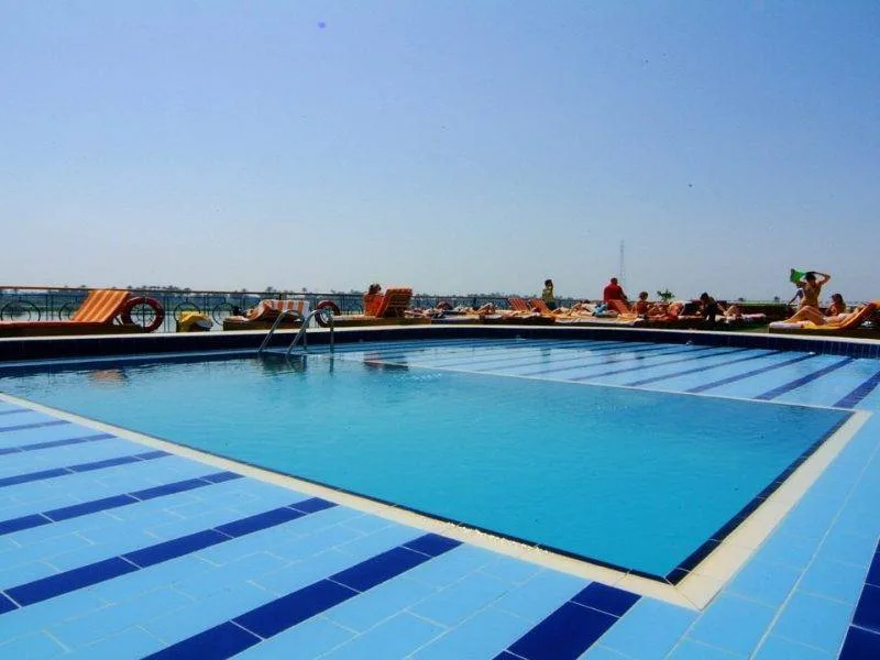 Enjoying swimming pool on the Royal Esadora Nile Cruise sundeck