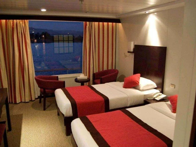 Spacious deluxe cabins onboard Mövenpick MS Royal Lily Nile Cruise with Nile view.