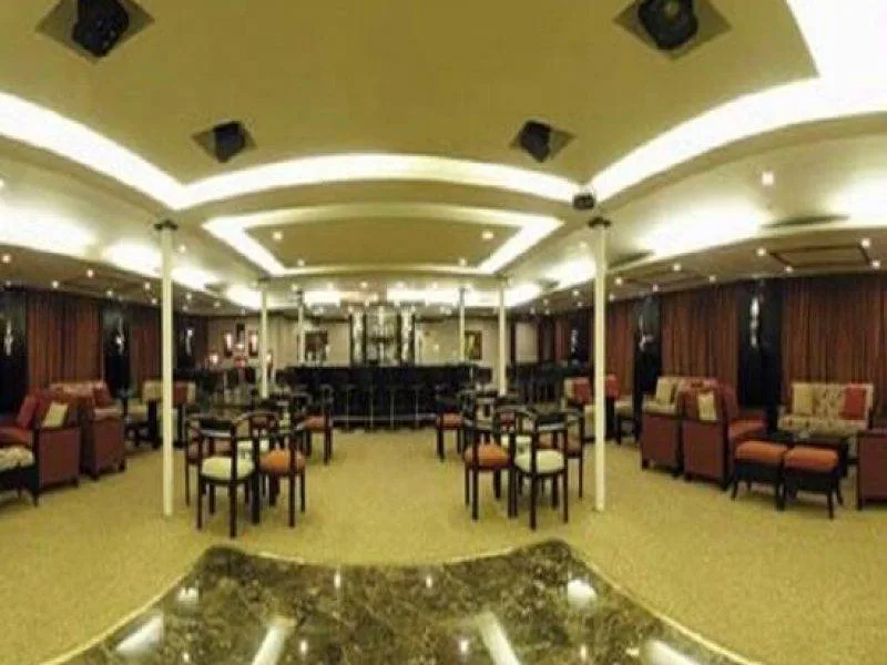 Elegant lounge onboard Mövenpick MS Royal Lily Nile Cruise with panoramic Nile River views.