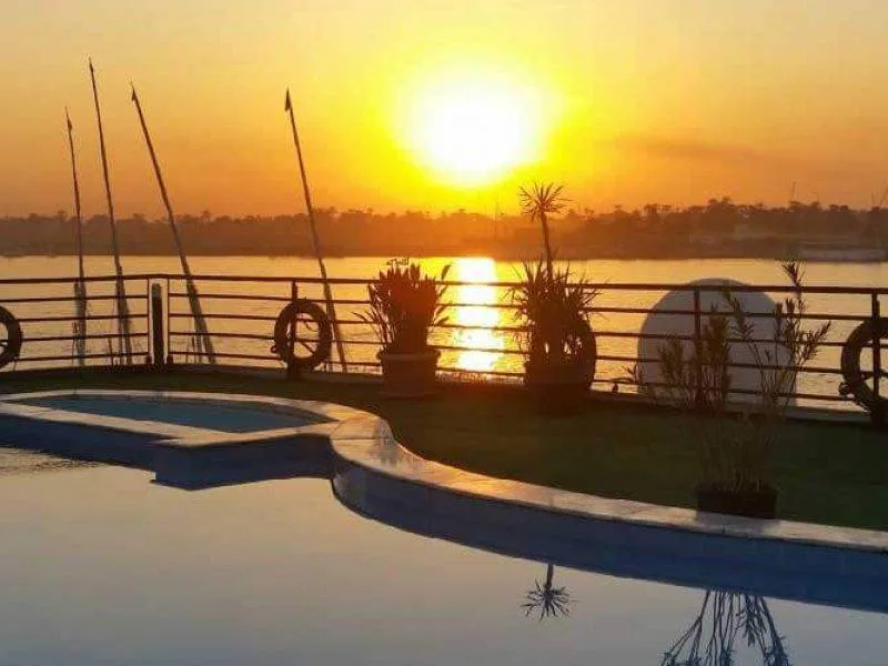 Swimming pool deck with Nile River views on MS Nile Dolphin Nile Cruise