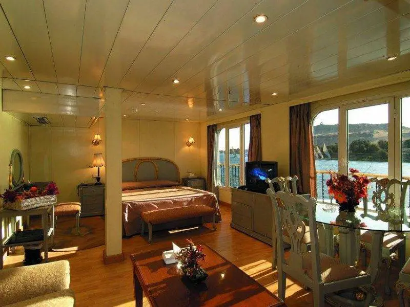 Spacious suite with king bed aboard Nile Quest Nile Cruise