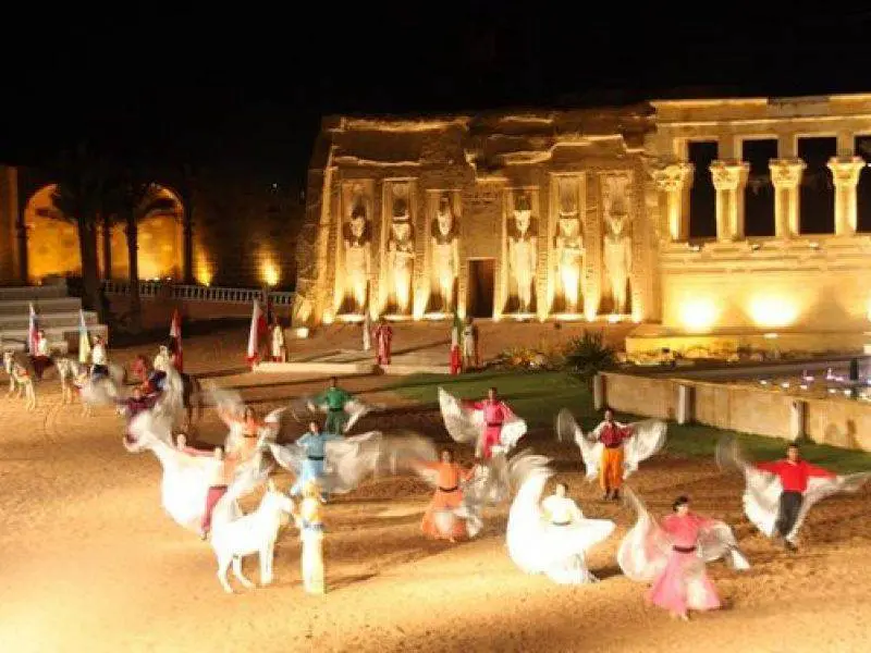 Alf Leila Wa Leila Show entrance lit at night in Hurghada