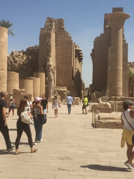 Egyptologist guide explaining ancient inscriptions at Karnak