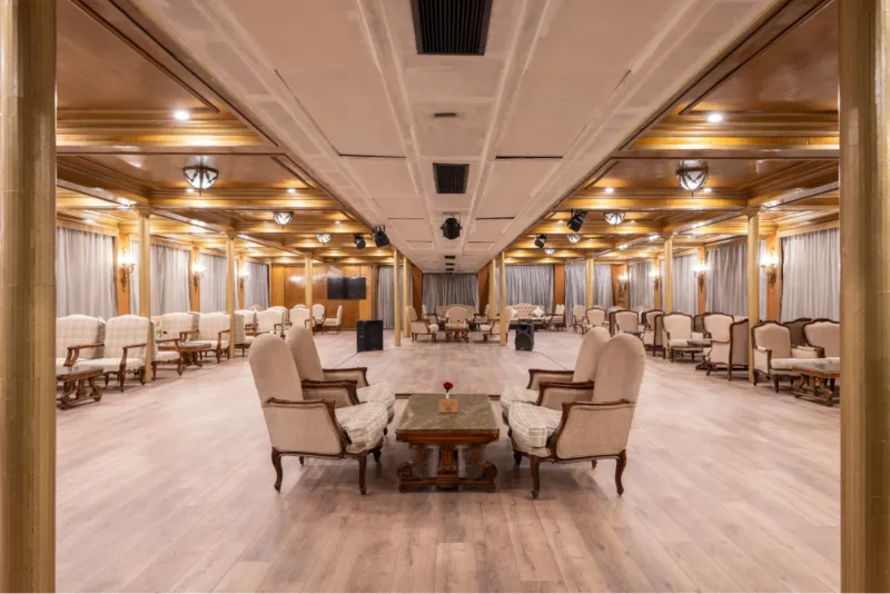 Modern lounge bar with comfortable seating and scenic Nile views on the M/S Kleos luxury Nile cruise