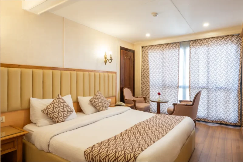 Spacious modern cabin with panoramic Nile views on the M/S Kleos Nile Cruise, perfect for a luxury Aswan to Luxor itinerary
