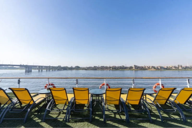Stunning Nile River sunset from the deck of the M/S Kleos Nile Cruise, part of a luxury 3-night or 4-night Nile cruise package