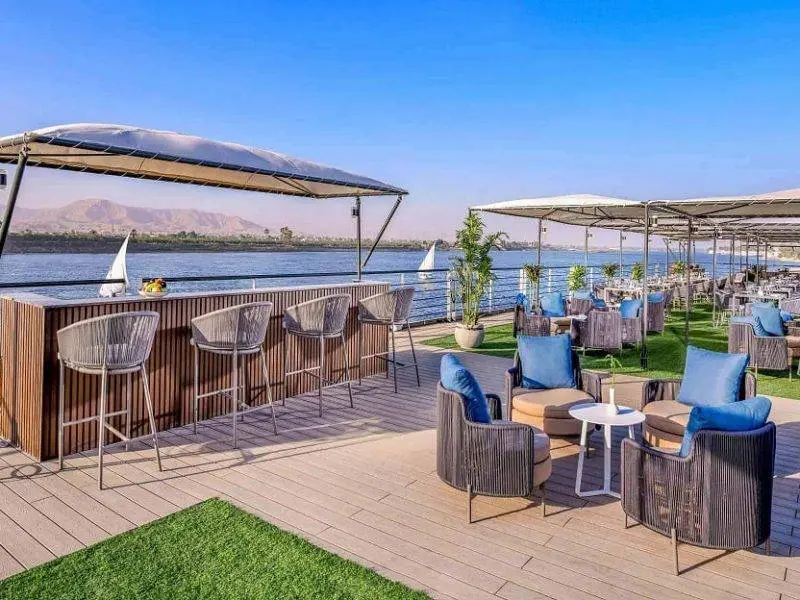 Sun deck on Historia Boutique Hotel Nile Cruise with lounge chairs and Nile River views